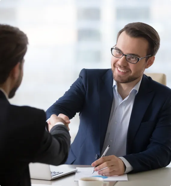 a criminal lawyer shaking a hand with a client